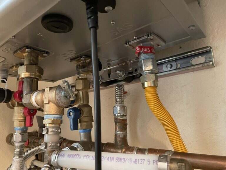 Water heater gas line, shutoff valves and flexible connector at a residential install
