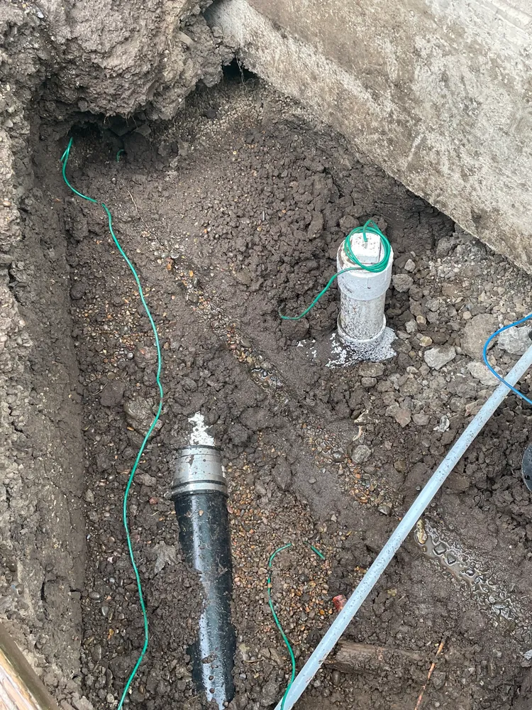 Pipe exposed in a water line trench
