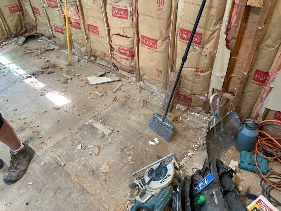 Excavation beside a home for sewer line work